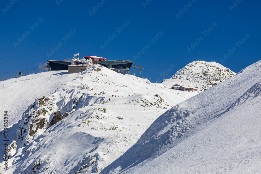 Chopok peak, cableway top station and alpine chalet, winter, Slovakia Chopok peak, cableway top station and alpine chalet, winter, Slovakia