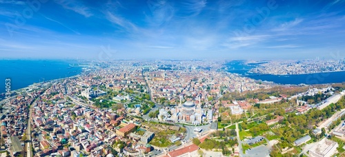 Aerial panoramic view of historical center of city and famous landmarks in Istanbul, Turkey. Blue Mosque and Hagia Sophia in Sultanahmet district of Istanbul. © IgorZh