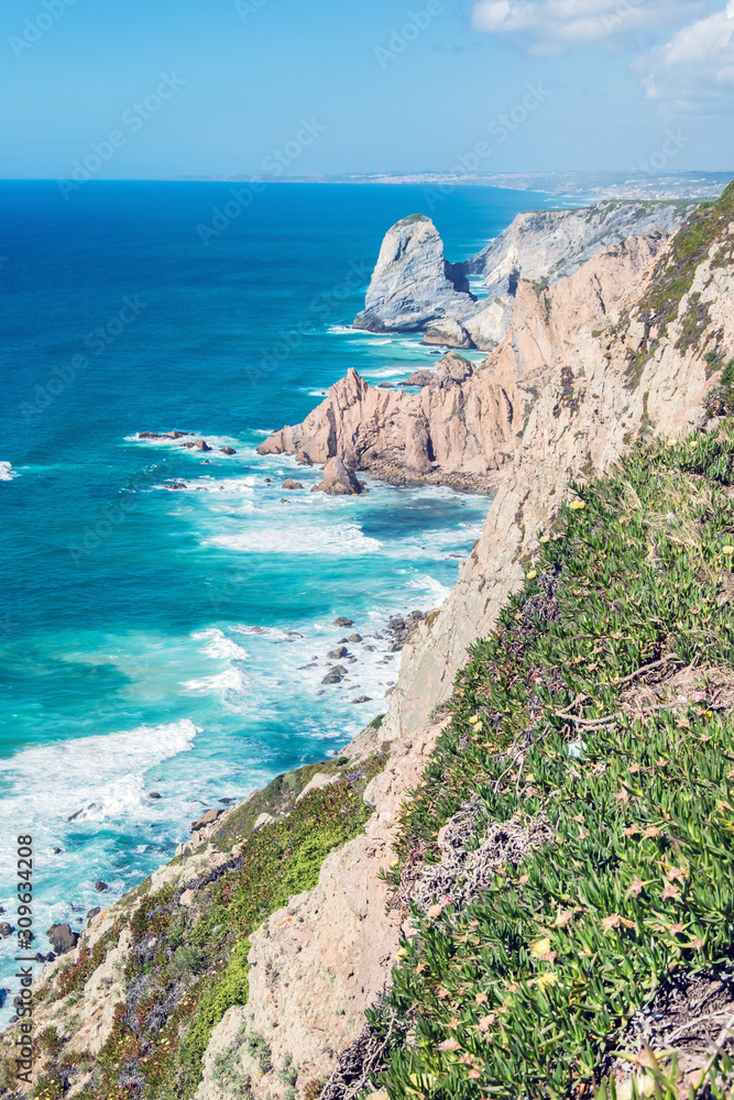 Cliffs over the Atlantic ocean. The westernmost point in Europe. The edge of the land. Cape Roca (Cabo da Roca), Portugal