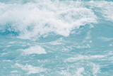 Blue ocean waves, tide. Swift current of river