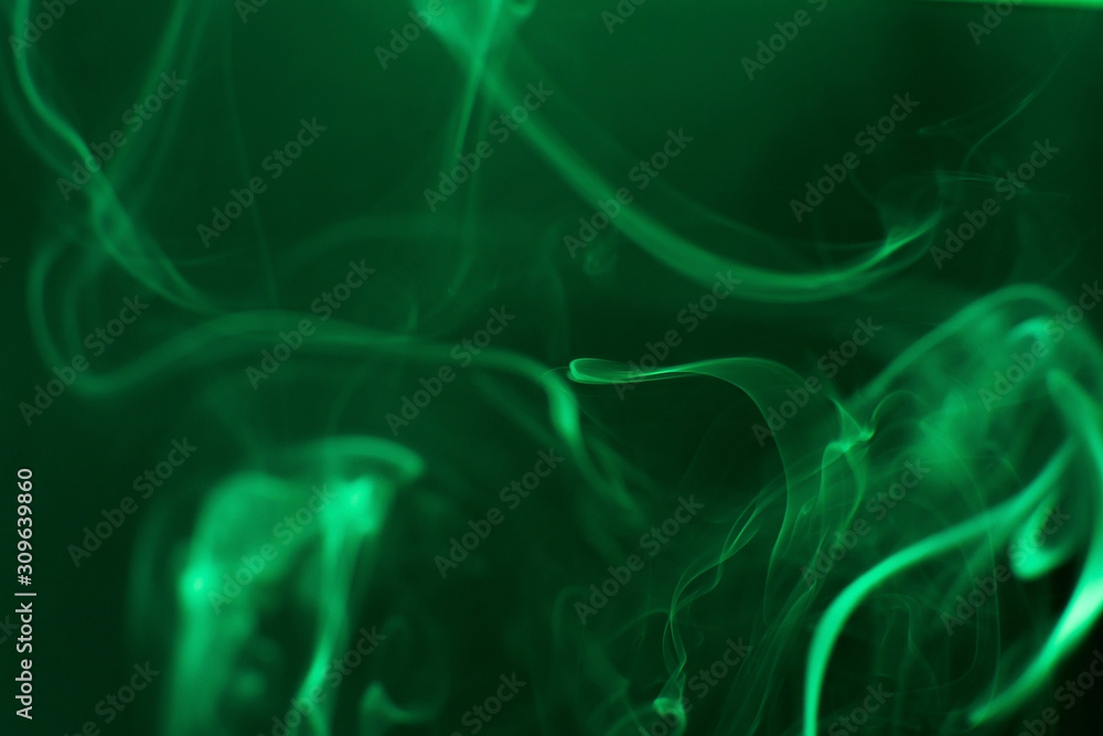 Mystic smoke patterns moving in colour on black background. Mystic smoke patterns moving in colour on black background.