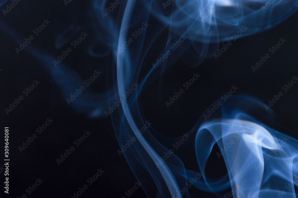 Obraz premium Colourful smoke fumes in different patterns on a black isolated background. Print for t-shirt.