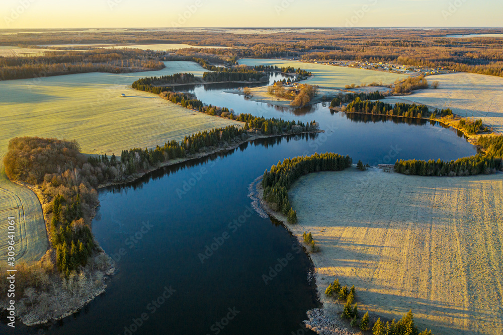 Obraz premium Aerial: a panorama view above the curvy lake