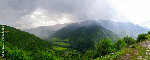 Panoramic view of Svan Towers in Mestia at sunset, Svaneti region, Georgia. It is a highland townlet in the northwest of Georgia, at an elevation of 1500 meters in the Caucasus Mountains. © miklyxa