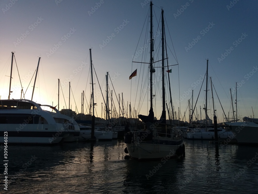 yachts in the marina at sunset