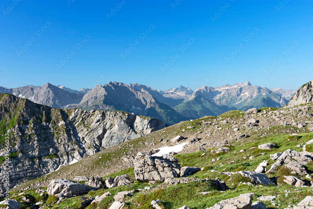 Alpine landscape with rocky mountains under blue sky. Lechtal Alps, Tirol, Austria