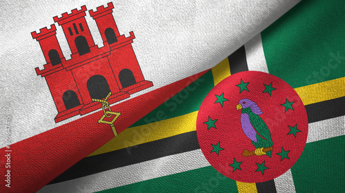 Gibraltar and Dominica two flags textile cloth, fabric texture photo