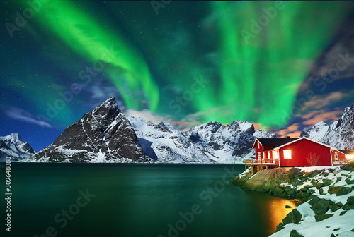 Aurora borealis over winter landscape - lofotens - Norway photo