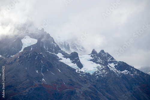 The Torres del Paine mountains in the clouds in autumn, Torres del Paine National Park, Chile © Marco Ramerini