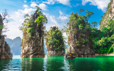 Beautiful nature scenic landscape view rock mountain Khao Sok national park with boat for travelers, Attractive famous popular place in Thailand, Destinations Scenery Asia, Water travel adventure trip