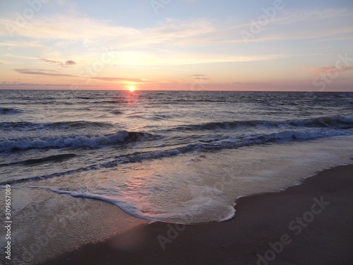 Fototapeta Naklejka Na Ścianę i Meble -  Sunset on the German North Sea beach in summer