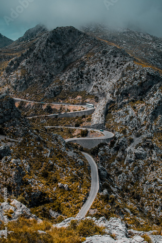 Amazing curved mountain roads on a bright summer vacation day. Exploring the mountains. National Park, Coll dels Reis, Sa Calobra, Serra de Tramuntana, Mallorca, Spain