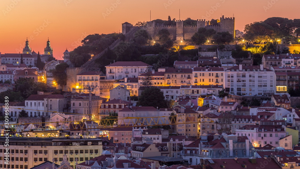 Lisbon aerial cityscape skyline night to day timelapse from viewpoint of St. Peter of Alcantara, Portugal