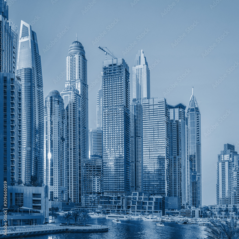 Dubai Marina at sunset. Classic Blue abstract background. Color of the year 2020.
