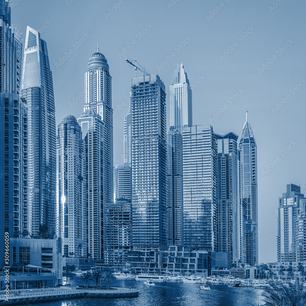 Fototapeta premium Dubai Marina at sunset. Classic Blue abstract background. Color of the year 2020.