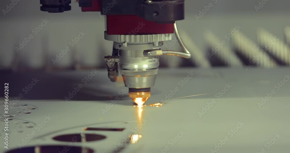 CNC Laser cutting of metal, modern industrial technology. CNC Laser cutting of metal, modern industrial technology.