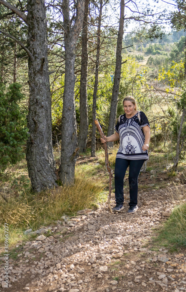Fototapeta premium Woman doing hiking