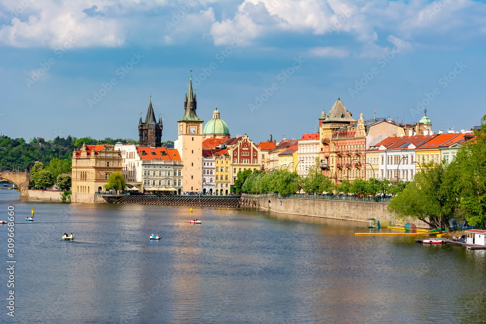 Prague cityscape with Old Town Bridge Tower and Vltava river, Czech Republic