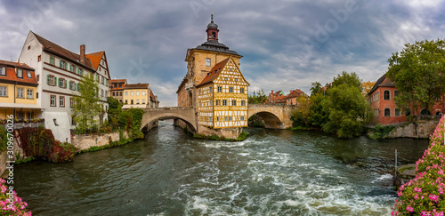 Altes Rathaus, a historical landmark building situated on an island accessible by pedestrian bridges, Bamberg, Germany. photo