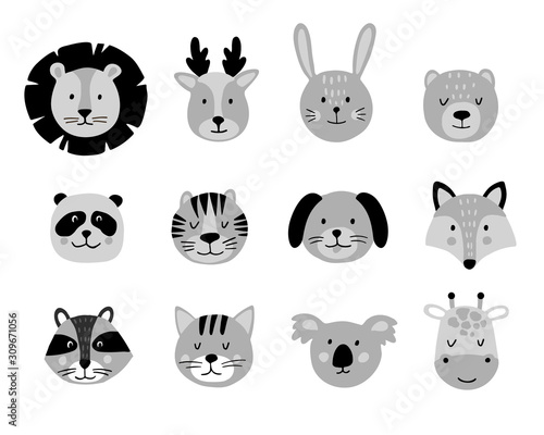 Fototapeta Naklejka Na Ścianę i Meble -  Cute animal hand drawn faces set on white background. Cartoon characters of lion, giraffe, deer, koala, bear, cat, bunny, fox, raccoon, tiger, dog, panda. Scandinavian design style.Vector illustration