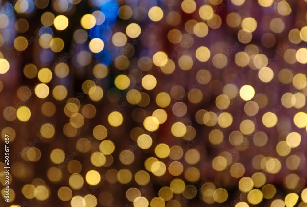 Beautiful golden bokeh light circles against dark background. Festive pattern. Beautiful golden bokeh light circles against dark background. Festive pattern.