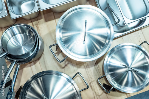 Fotografie Stainless steel dishes on the table