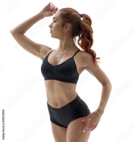 Wallpaper Mural Cute fitness girl posing standing on tiptoe Torontodigital.ca