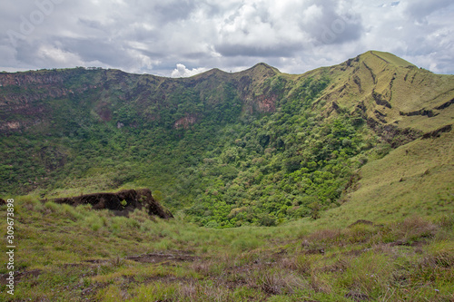 Dormant and forested crater in Masaya Volcano National Park, Nicaragua.