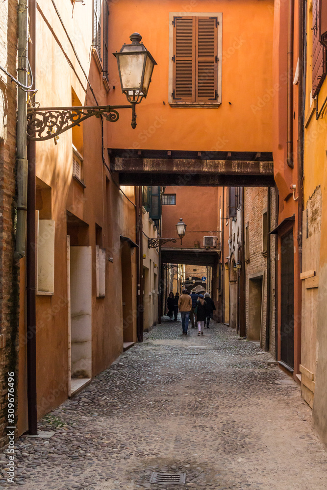 A walk in the old center of Ferrara, Italy