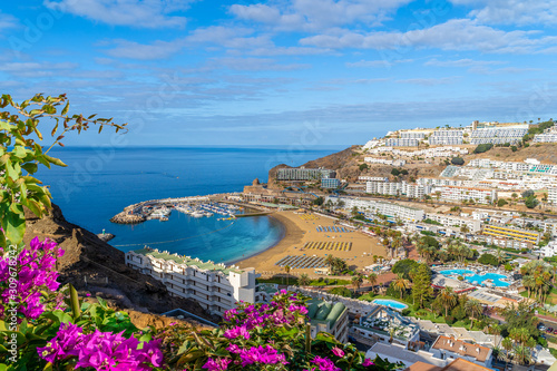 Landscape with  Puerto Rico village and beach on Gran Canaria, Spain photo