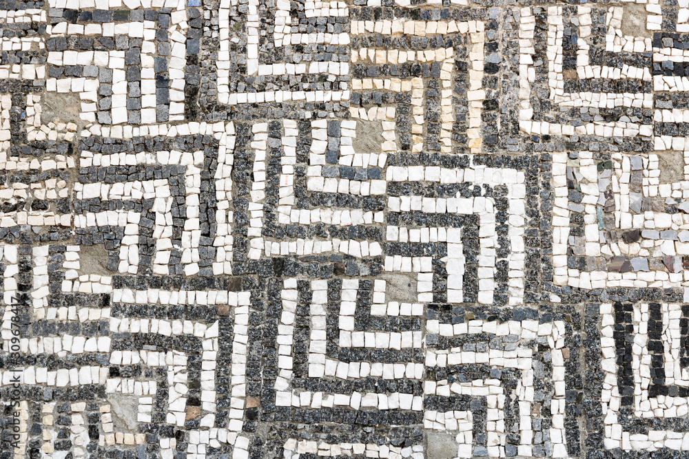 Geometric mosaic made from stone. Antique pattern. Geometric mosaic made from stone. Antique pattern.