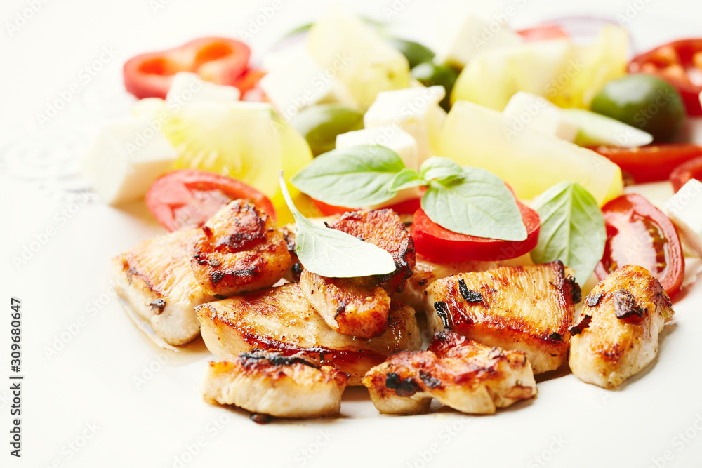 Fried chicken breast with fresh salad. Close up. Fried chicken breast with fresh salad. Close up.