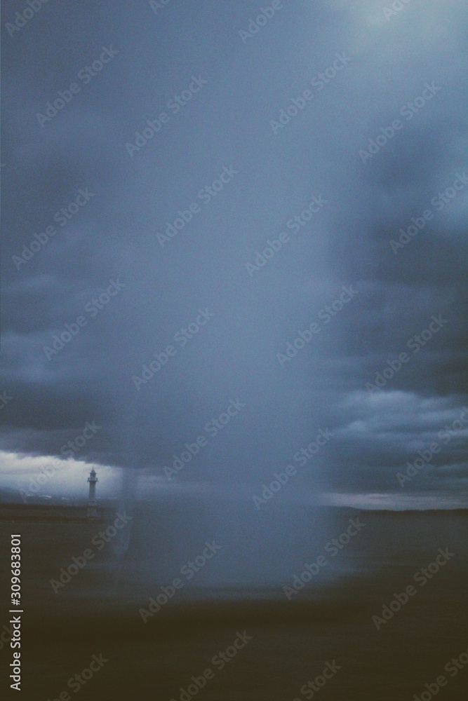 storm clouds and Jet D'eau water storm clouds and Jet D'eau water