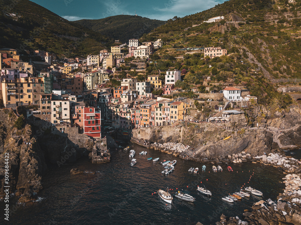 Riomaggiore of Cinque Terre, Italy - Traditional fishing village in La Spezia, situate in coastline of Liguria of Italy. Riomaggiore is one of the five Cinque Terre travel attractions.