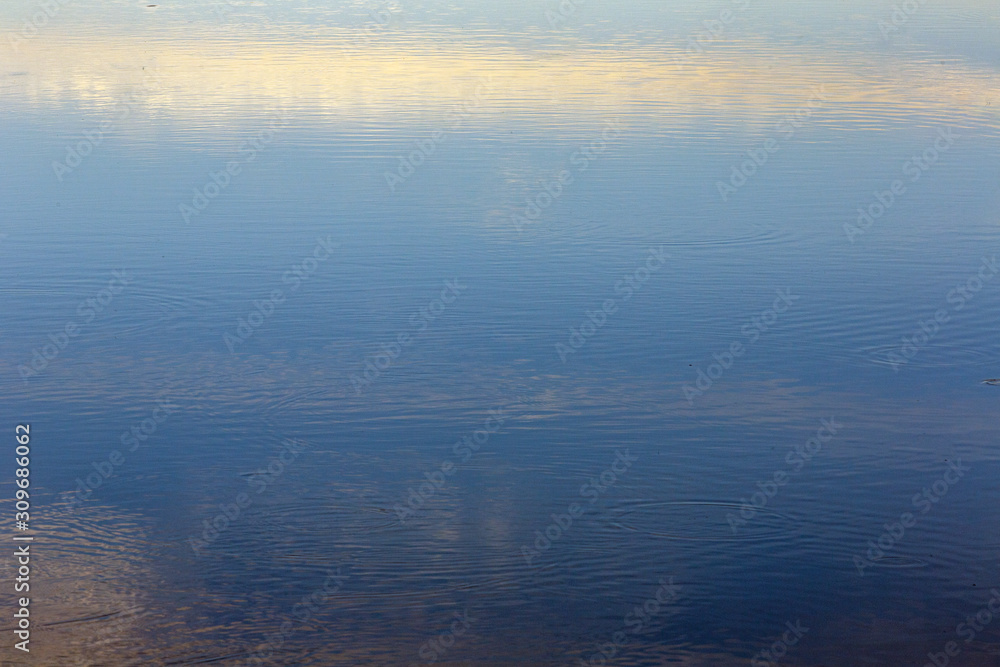 Blue water reflection sky abstract background
