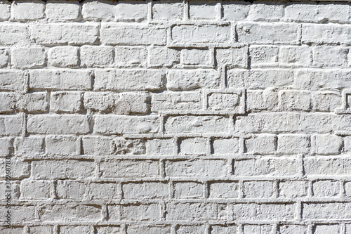 White brick wall rough mortar 