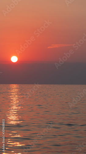 Pink sunset in the sea  gentle romantic natural background.