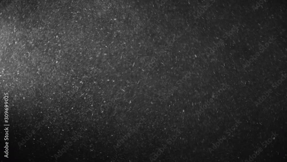 Natural Organic Dust Particles Floating On Black Background. Glittering Sparkling Particles Randomly Spin In The Air With Bokeh. Dynamic Particles With Fast And Slow Motion. Shimmering Dust In Space. Natural Organic Dust Particles Floating On Black Background. Glittering Sparkling Particles Randomly Spin In The Air With Bokeh. Dynamic Particles With Fast And Slow Motion. Shimmering Dust In Space.