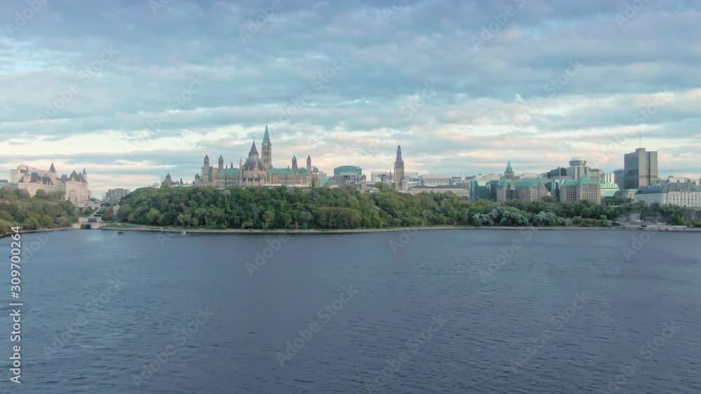 Aerial over the Ottawa River & Parliament Hill to the Library of Parliament. Ottawa, Ontario, Canada. 11 September 2019 Aerial over the Ottawa River & Parliament Hill to the Library of Parliament. Ottawa, Ontario, Canada. 11 September 2019