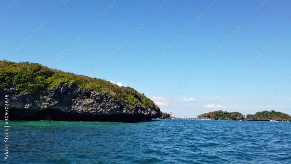 Sailing around the Hundred Islands in a Bangka Boat in the Summer Season, located in Alaminos, Pangasinan, Zambales, in the Philippines Sailing around the Hundred Islands in a Bangka Boat in the Summer Season, located in Alaminos, Pangasinan, Zambales, in the Philippines