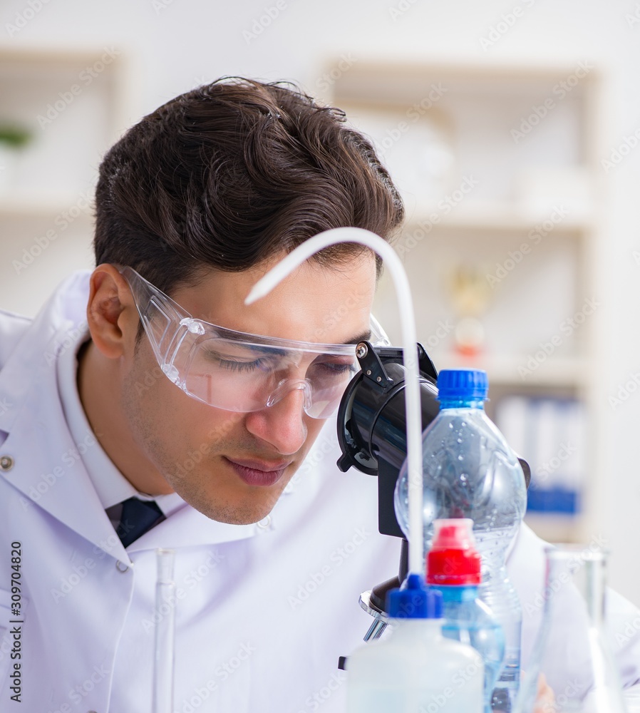 Lab assistant testing water quality Lab assistant testing water quality