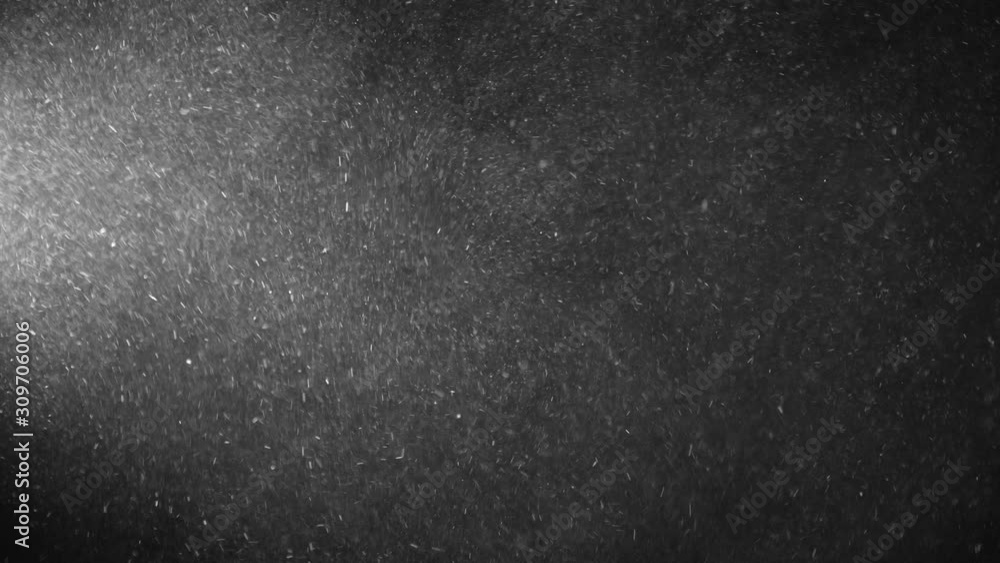 Natural Organic Dust Particles Floating On Black Background. Glittering Sparkling Particles Randomly Spin In The Air With Bokeh. Dynamic Particles With Fast And Slow Motion. Shimmering Dust In Space. Natural Organic Dust Particles Floating On Black Background. Glittering Sparkling Particles Randomly Spin In The Air With Bokeh. Dynamic Particles With Fast And Slow Motion. Shimmering Dust In Space.
