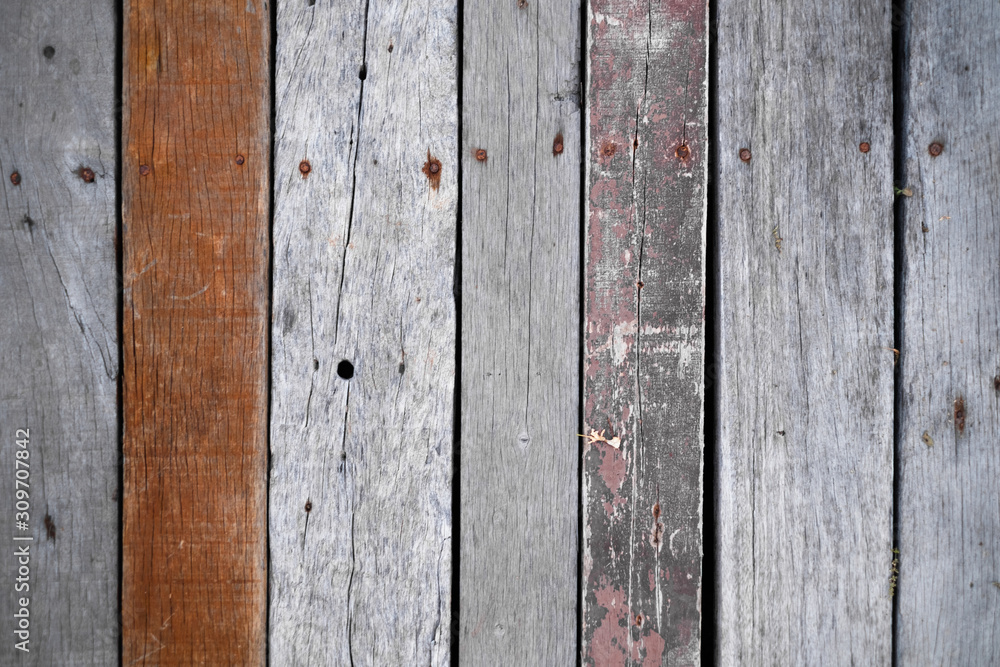 Fototapeta premium Dark brown wood texture with natural striped pattern background