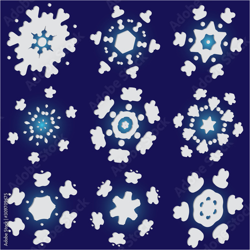 Kit of isolated  silhouettes of snowflakes on blue background.