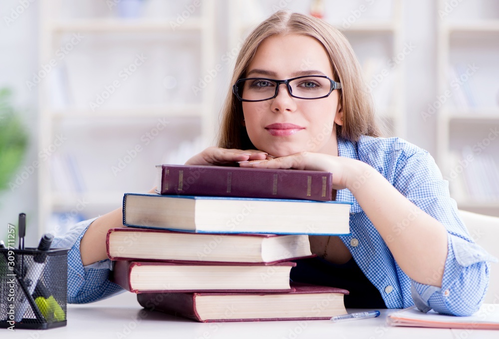 Young teenage female student preparing for exams at home Young teenage female student preparing for exams at home