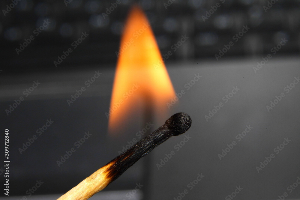 the flame of a burning match the flame of a burning match