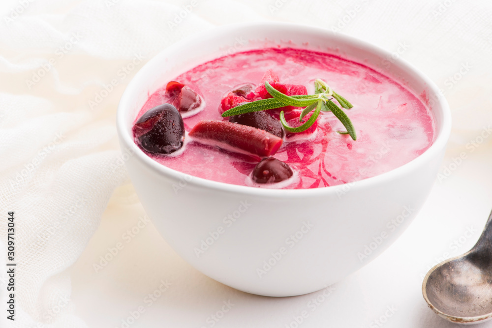 Beet root european soup called borscht with parsley Beet root european soup called borscht with parsley