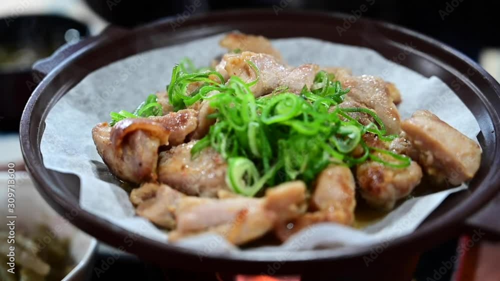 Roasted chicken in a hotpot is a healthy Japanese dish Roasted chicken in a hotpot is a healthy Japanese dish