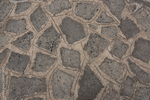 Irregularly shaped green brick paving pavement texture