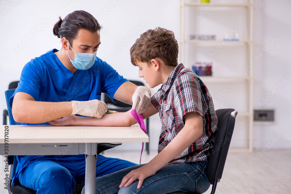 Young boy visiting doctor in hospital Young boy visiting doctor in hospital